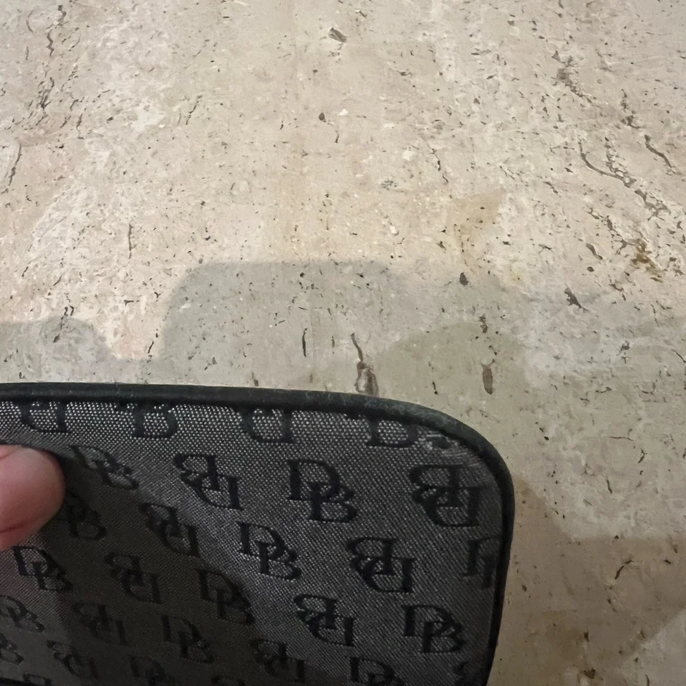 Dooney and Bourke Vintage Signature Wristlet
